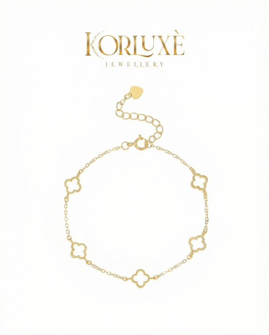 Lucky clover charm bracelet featuring a delicate clover design in gold with an adjustable chain.
